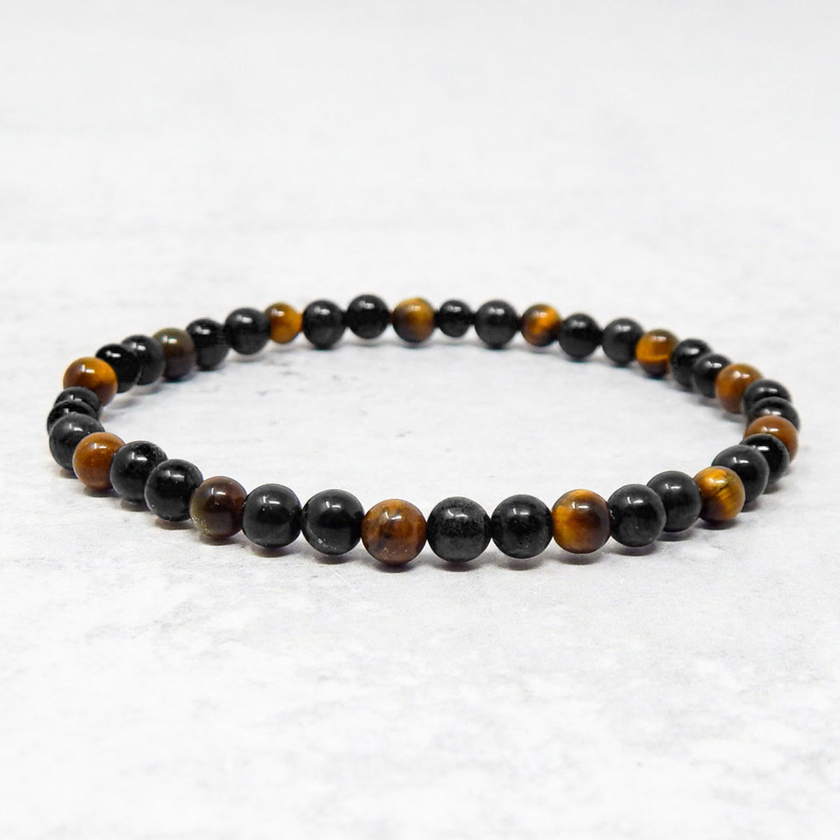 Pulsera elástica con piedras naturales ojo de tigre y ónix